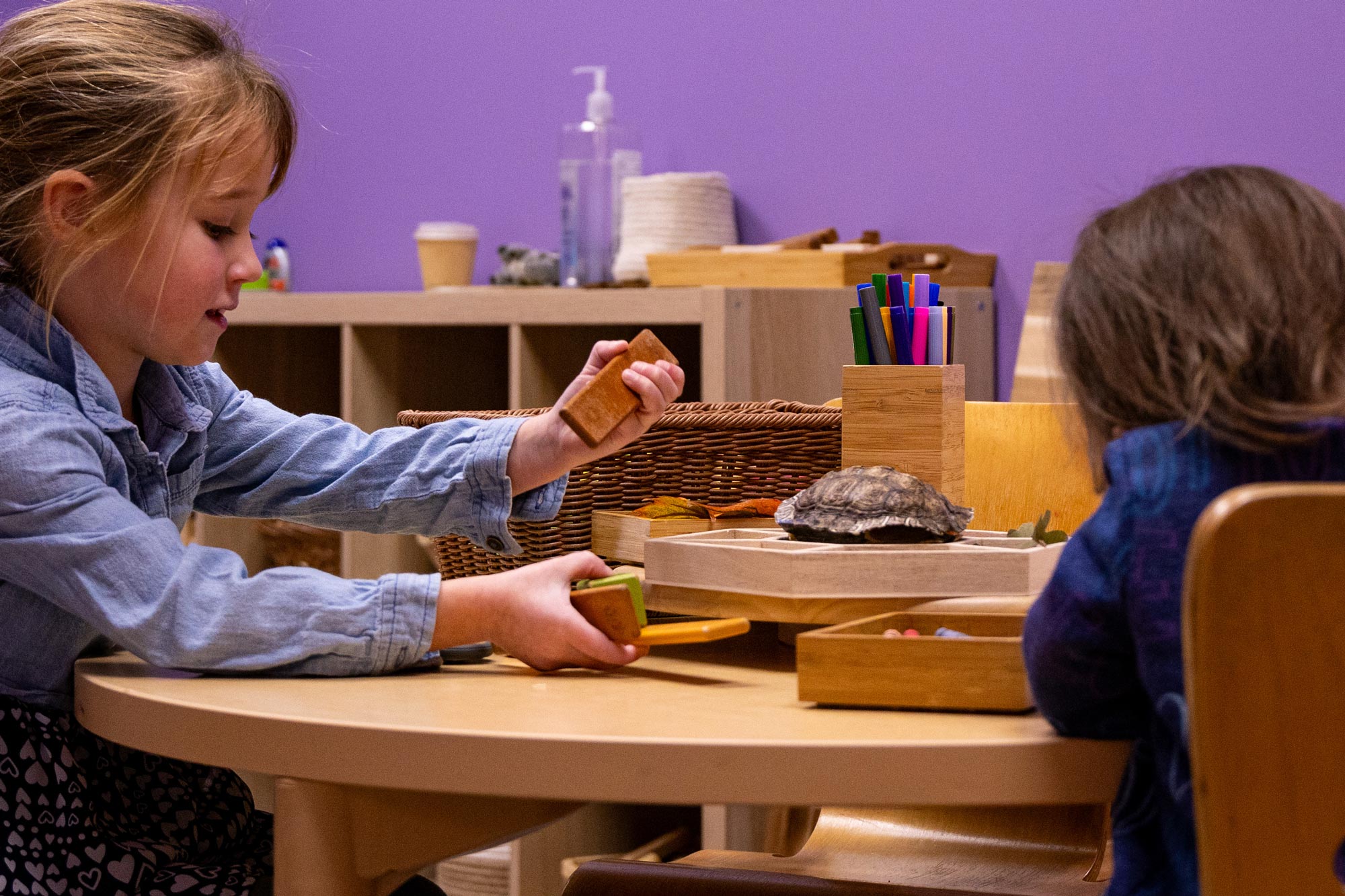 Children working at a table.