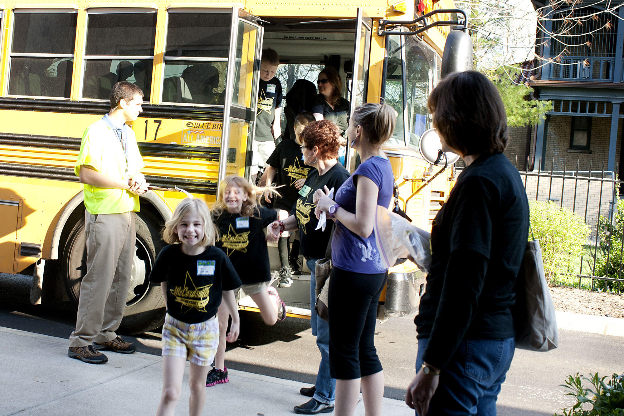 Students unloading from school buss.