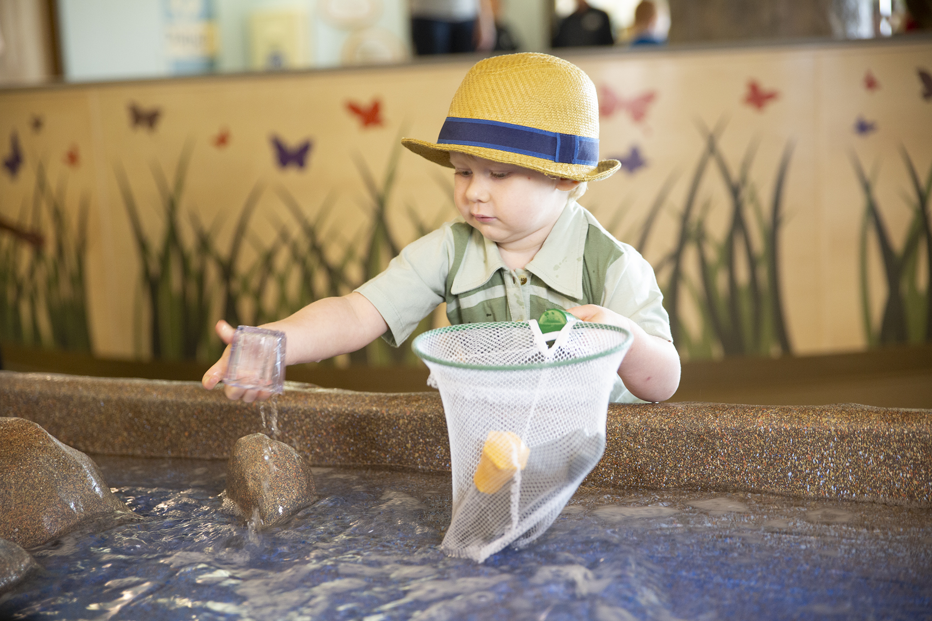 Child playing at Water Table.